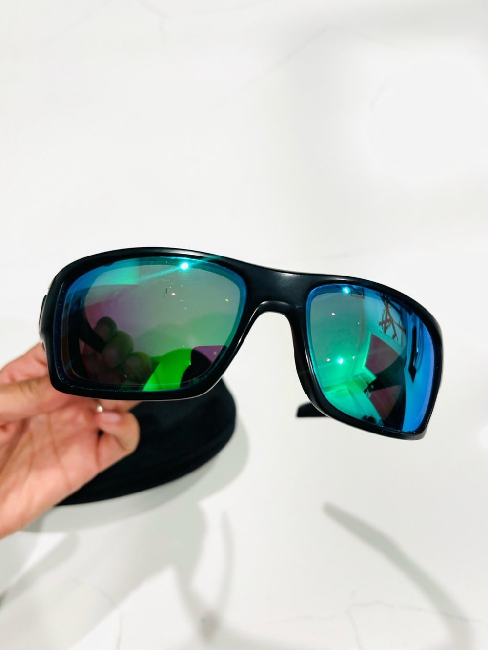 Oakley Black Frame Sunglasses with Green-Blue Mirrored Lenses